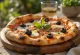 Pizza Puttanesca với cá cơm, nụ bạch hoa và oliu