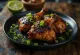 Gà Jerk được phục vụ với chanh và salad